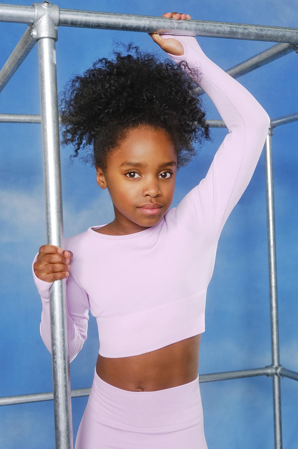 Camisetas y tops deportivos de niña