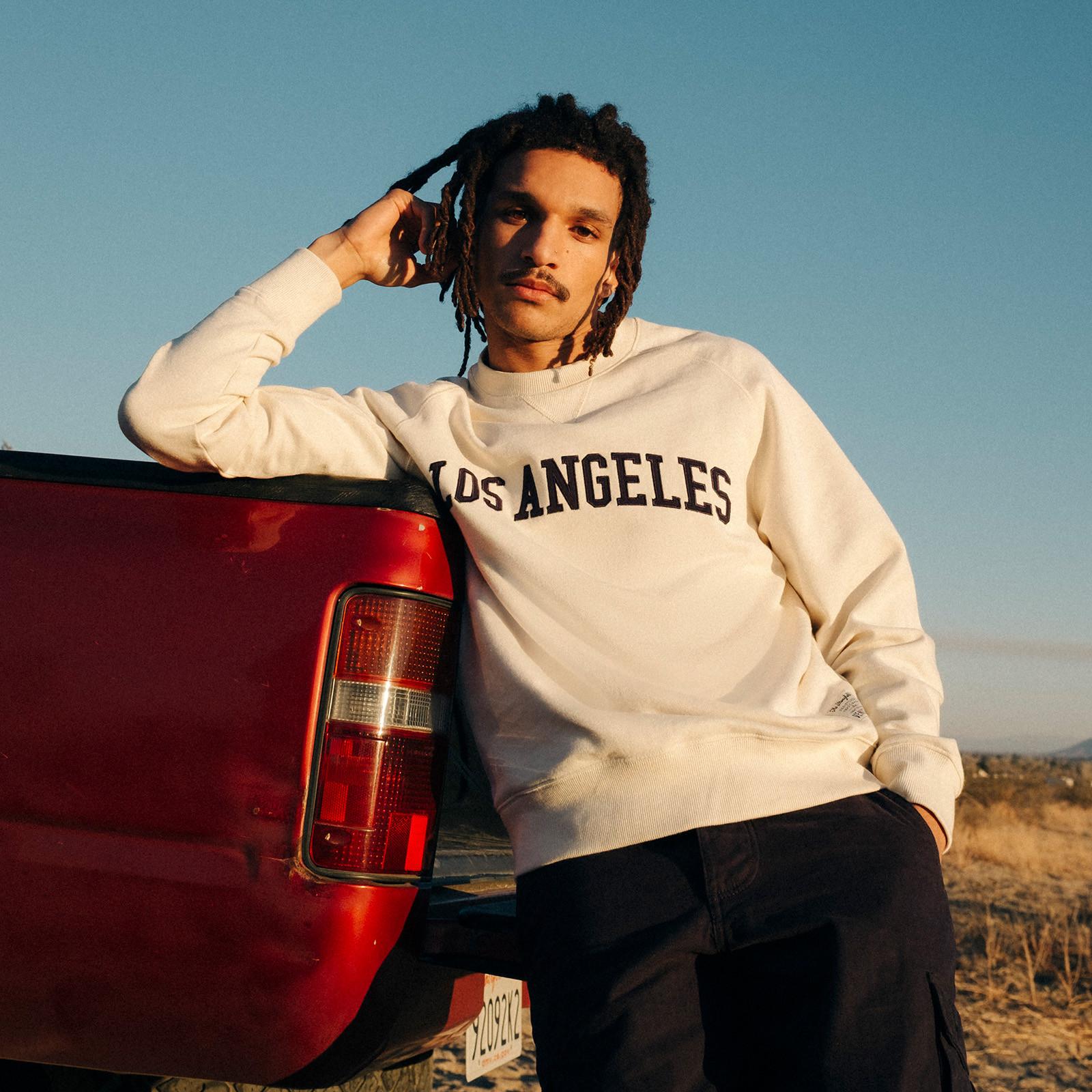 Model wears Los Angeles sweatshirt
