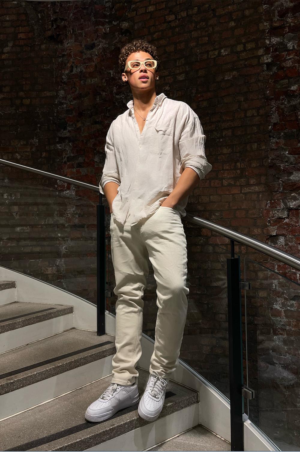 Ethan in white jeans, linen shirt, sunglasses