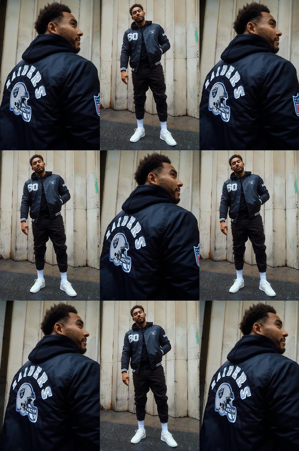 Josh Denzel portant une veste de style universitaire noire