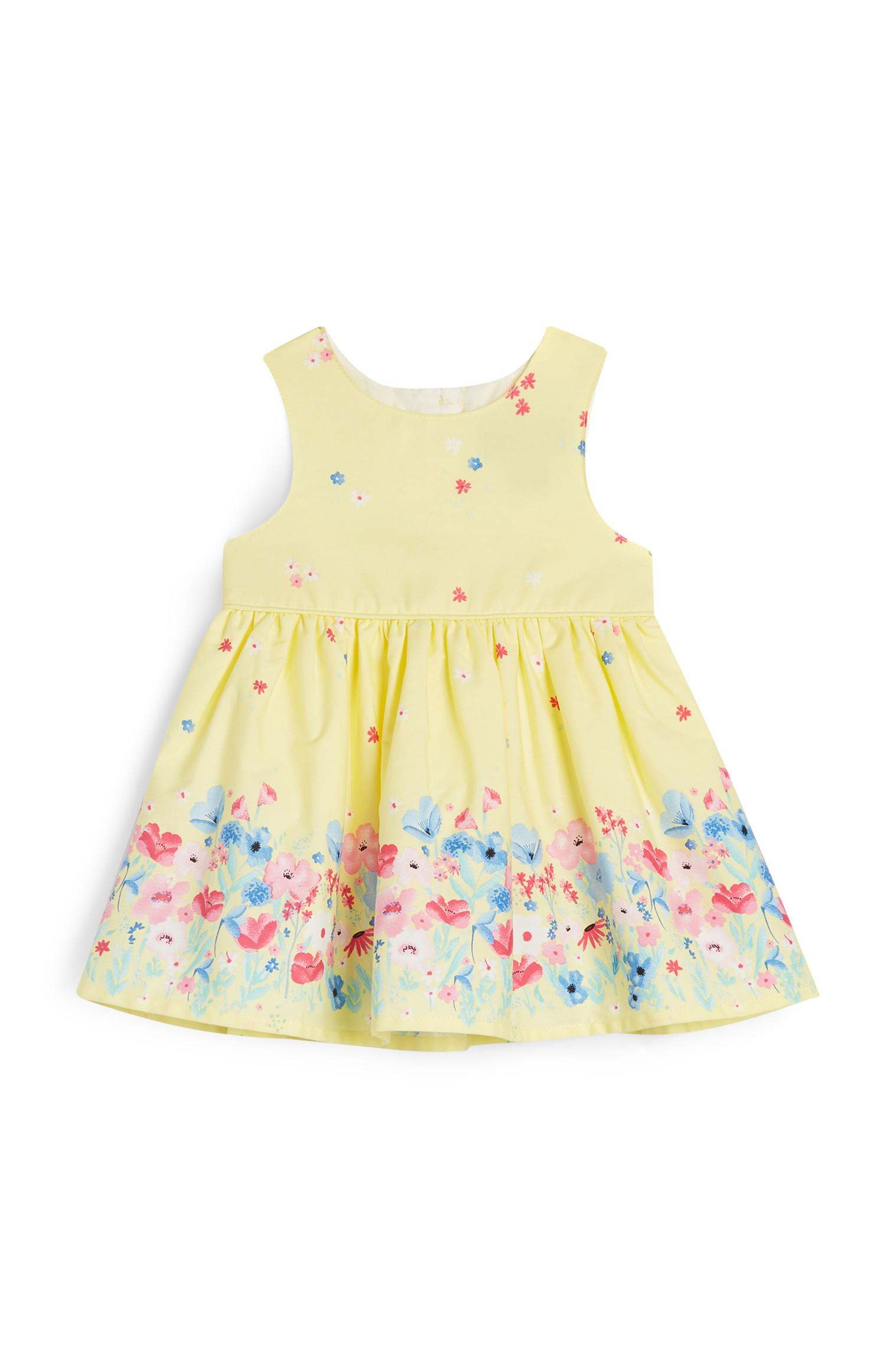 newborn yellow dress