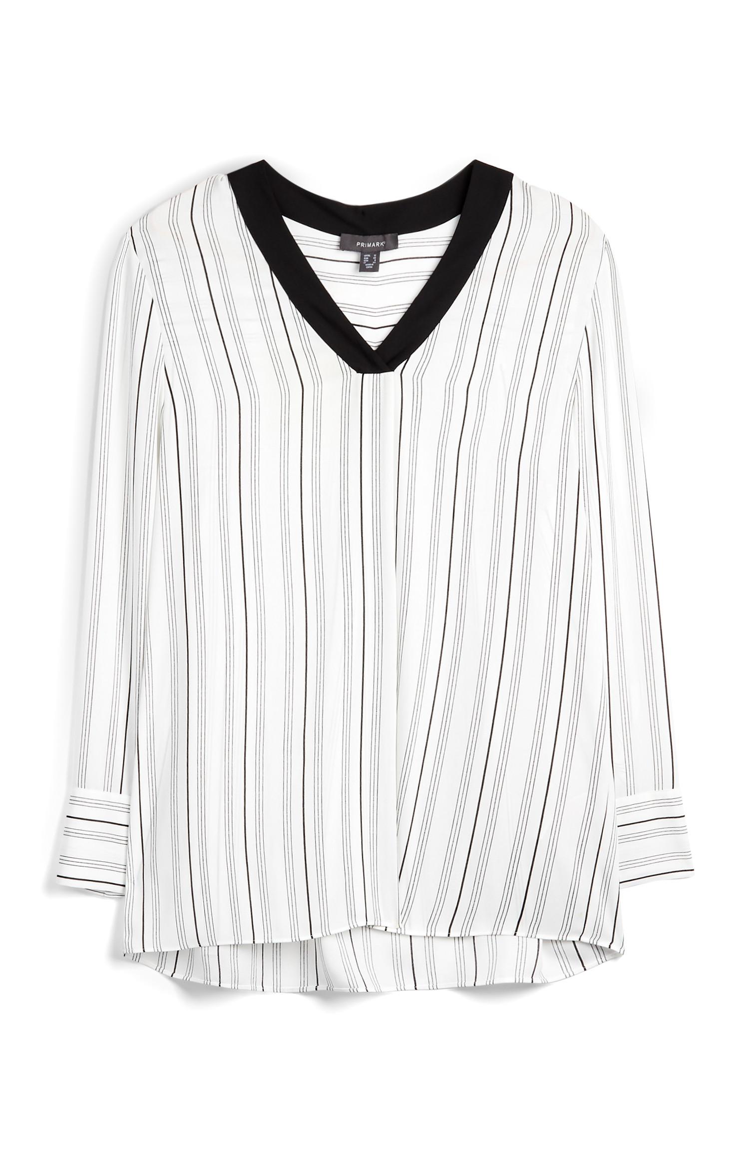 maglia bianca e nera