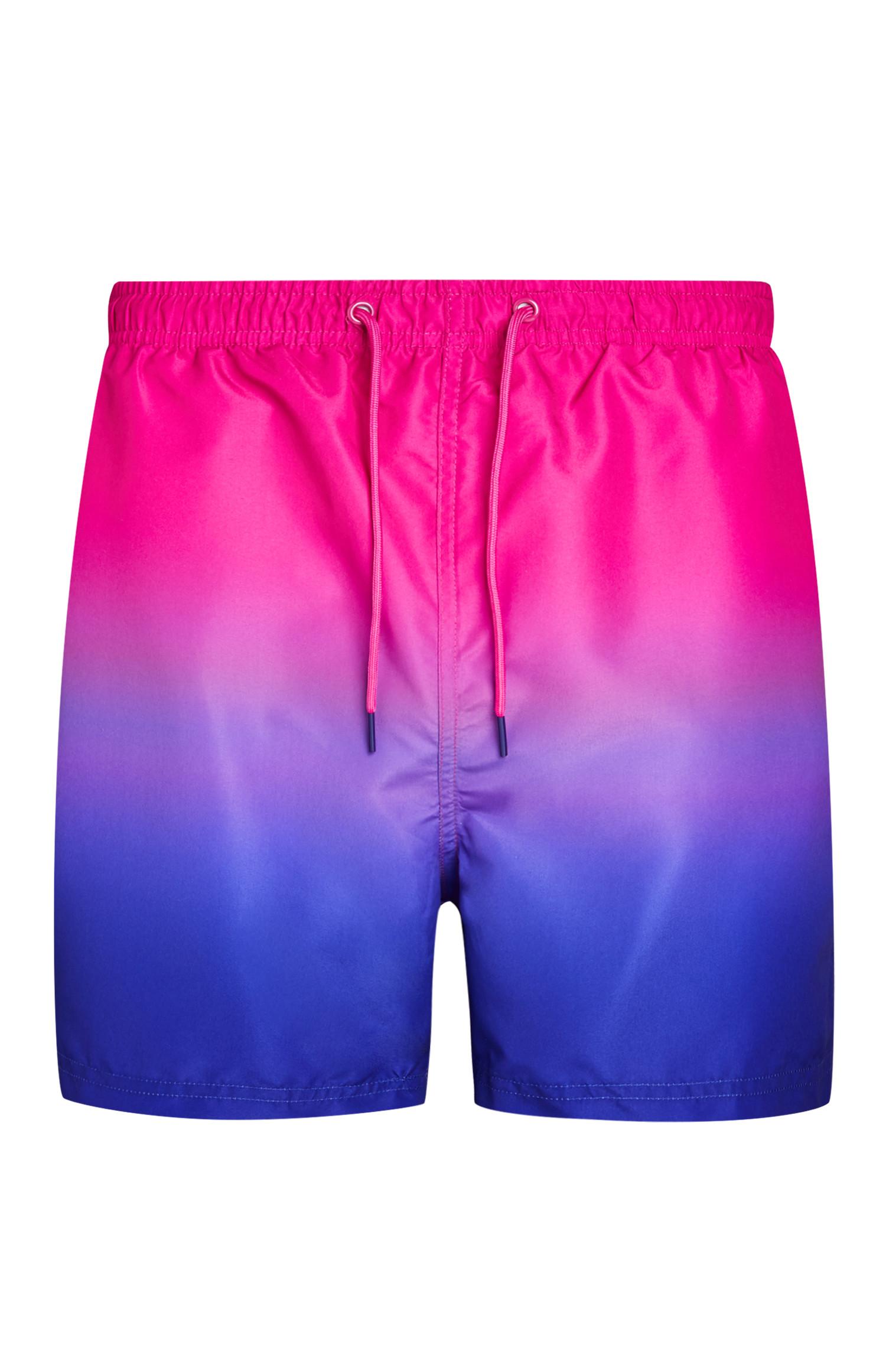 pink and blue swim trunks