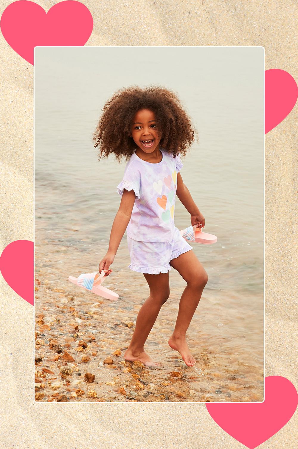 Child wears heart print two piece set