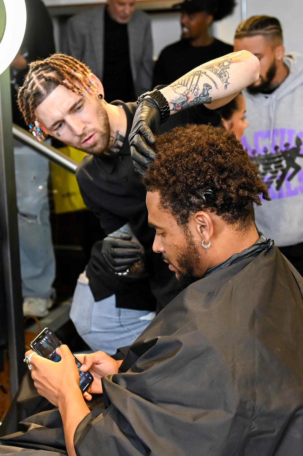 Smokey Barber cutting hair