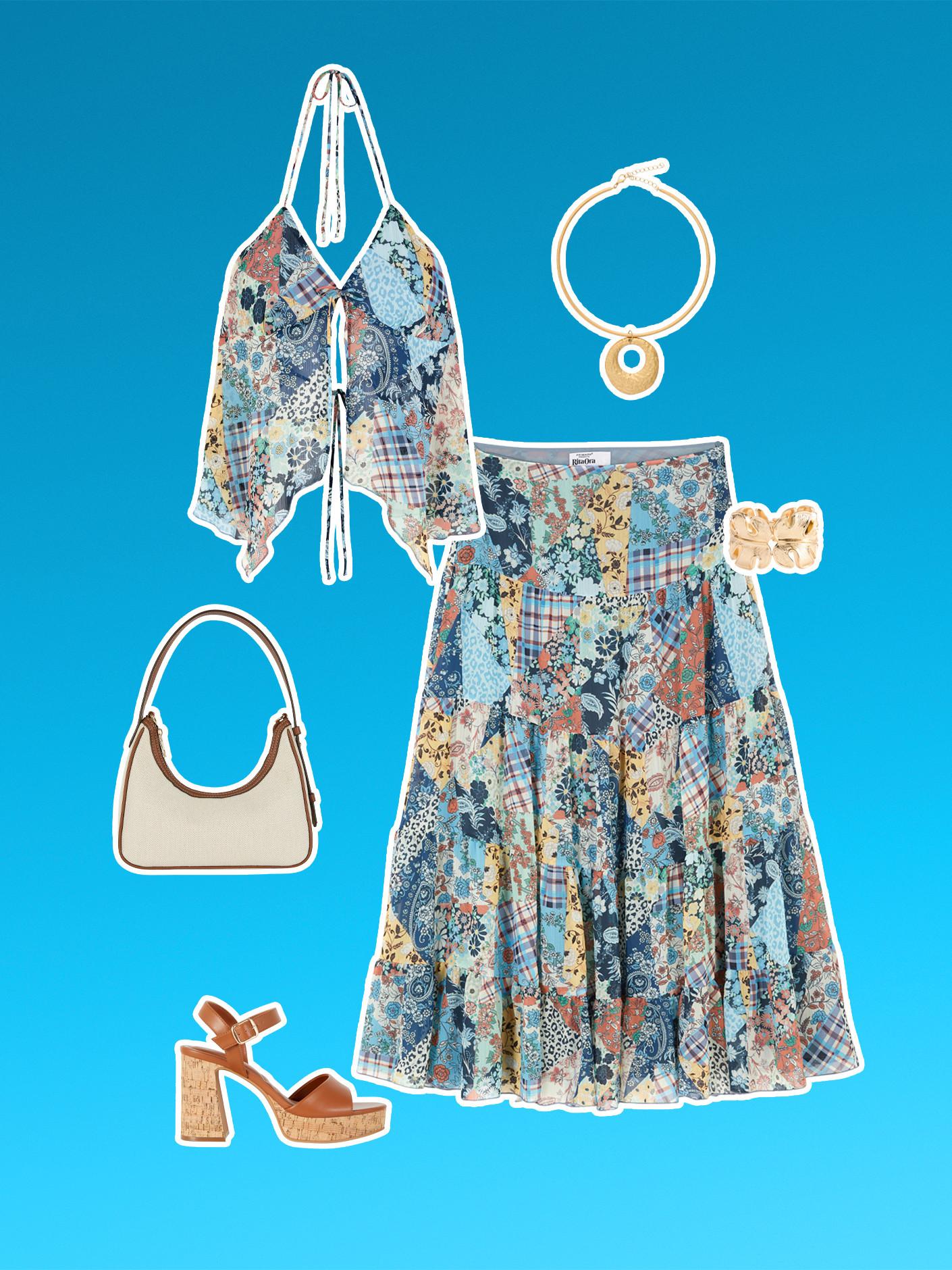 Top con stampa floreale patchwork e scollo all'americana e maxigonna coordinata, con accessori tra cui una borsa, sandali con tacco in sughero e collana con ciondolo color oro.