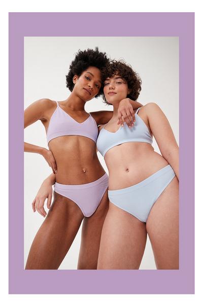 Models wear seamfree lilac and baby blue underwear sets