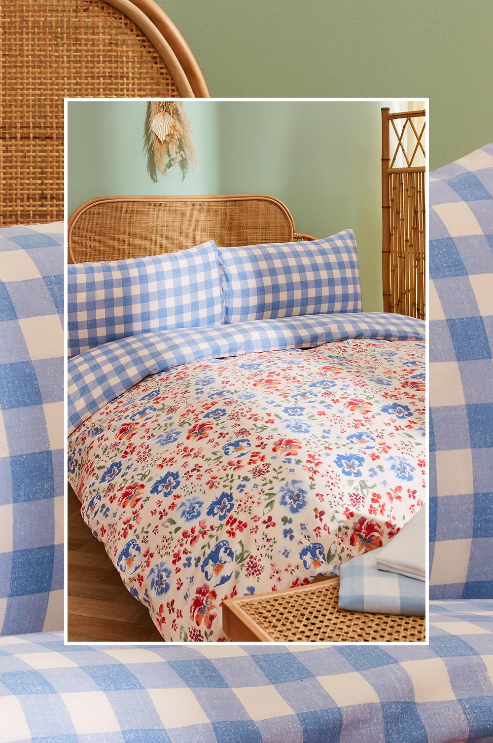 Bedroom set up with blue and white gingham bedsheets