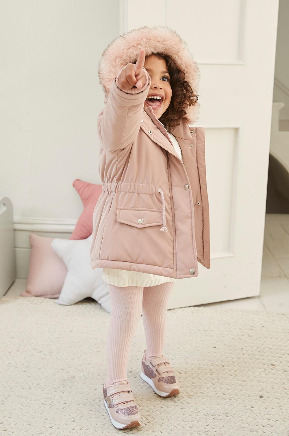 girl in pink coat