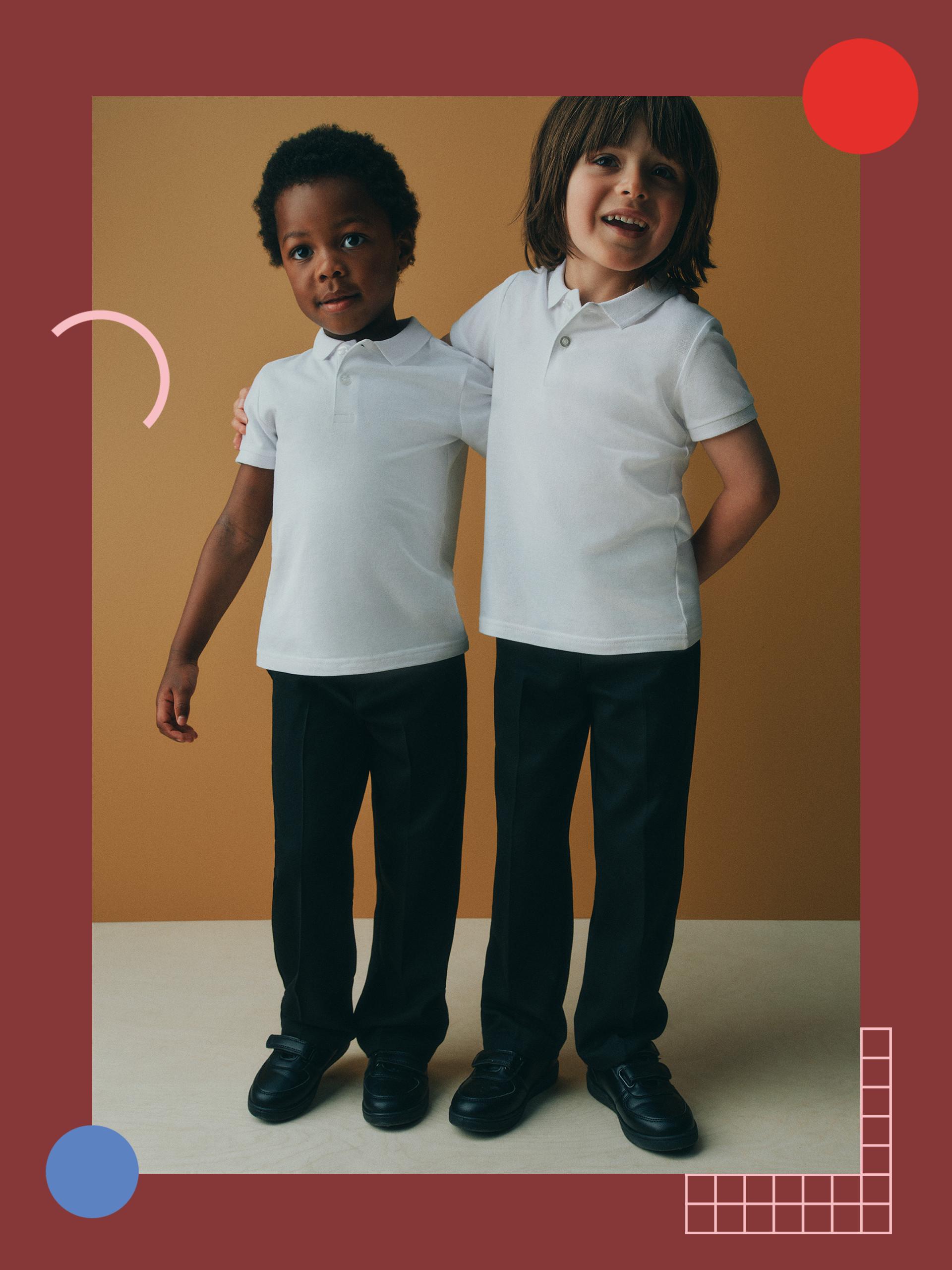 two models wearing white polo tops, black trousers and school shoes