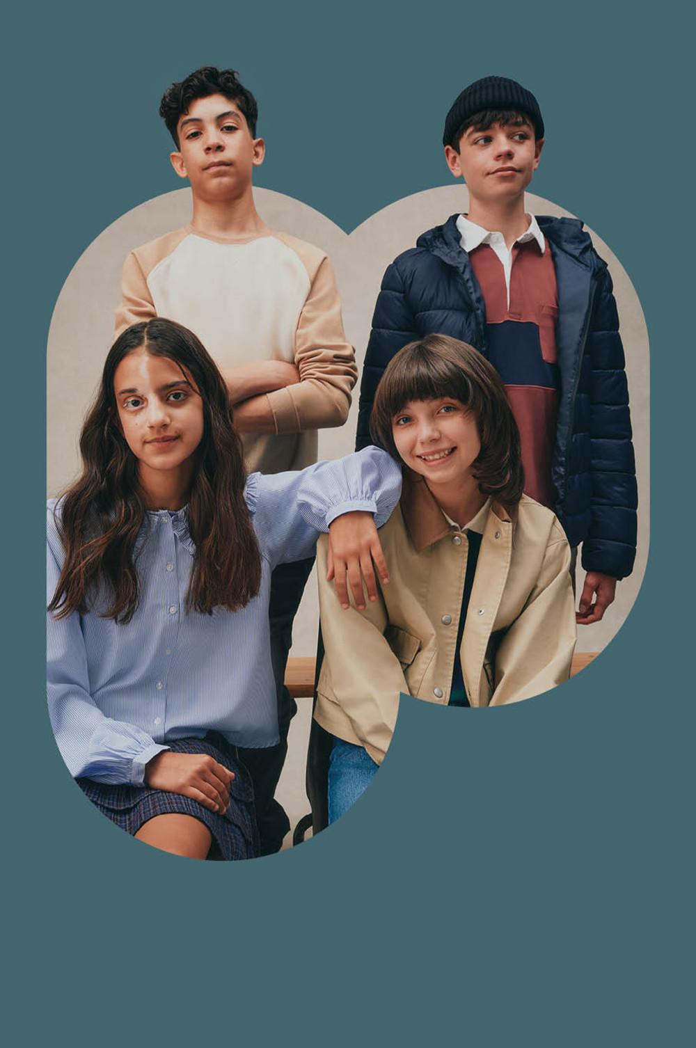 Four young people wearing casual clothing in a stylish fashion photoshoot against a teal backdrop.