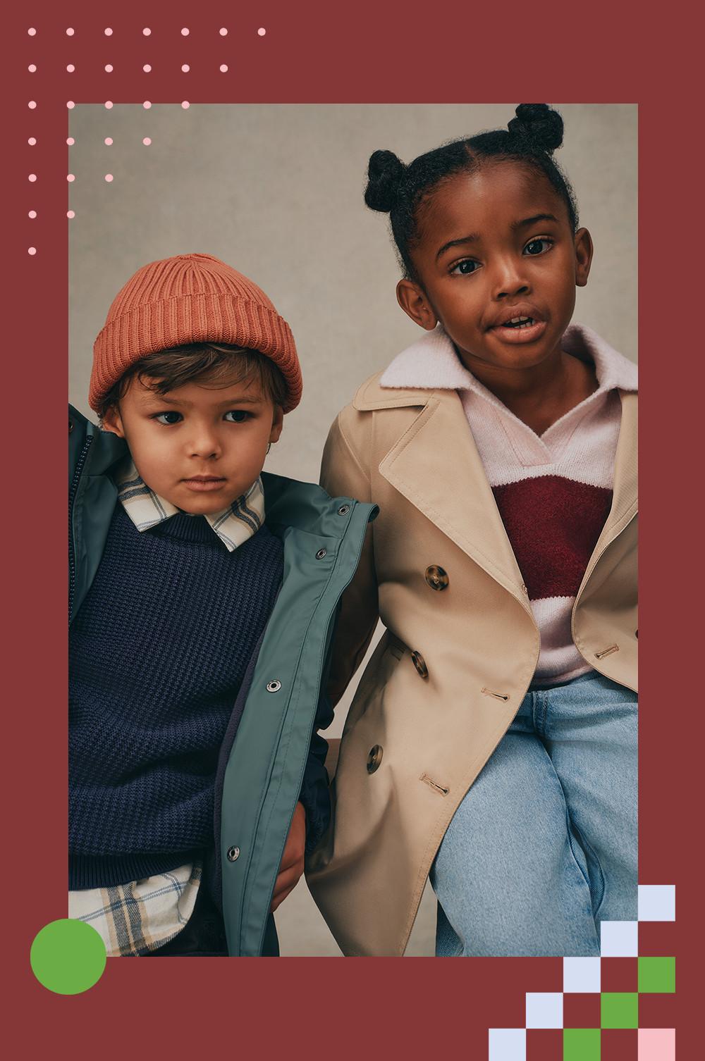 Children's winter fashion featuring a beanie hat, navy sweater, and trench coat ensemble.
