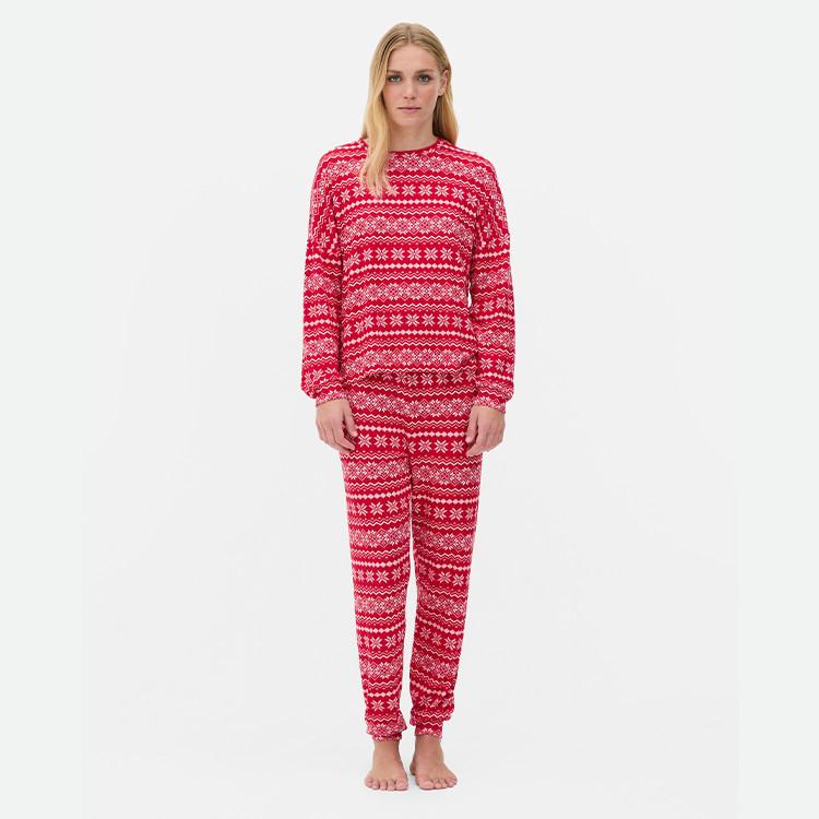 Red and white Fair Isle patterned pyjama set with long-sleeved top and matching trousers.