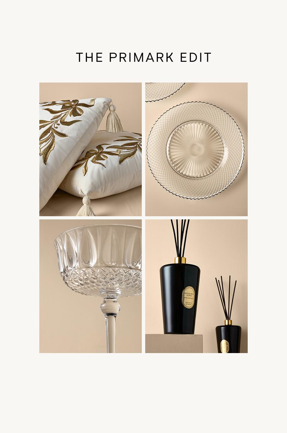 Primark Edit featuring elegant home accessories including embroidered cushions, glass tableware and black reed diffusers with gold accents.