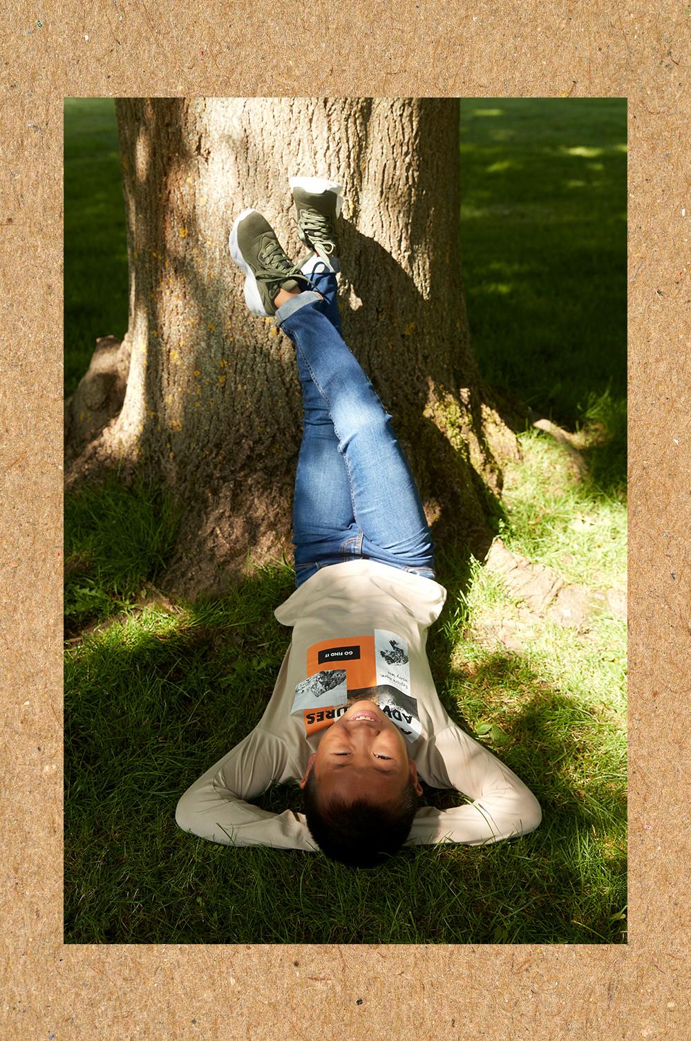 boy against tree