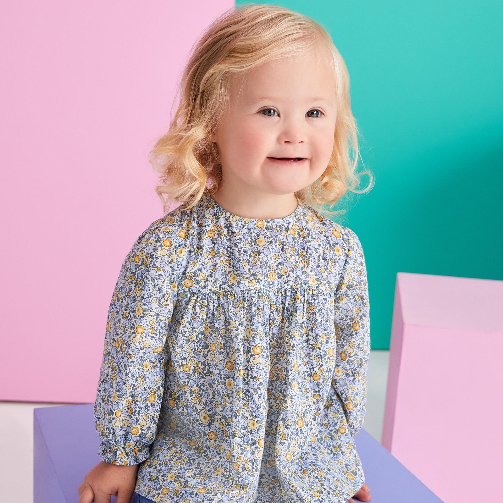 Child in floral dress