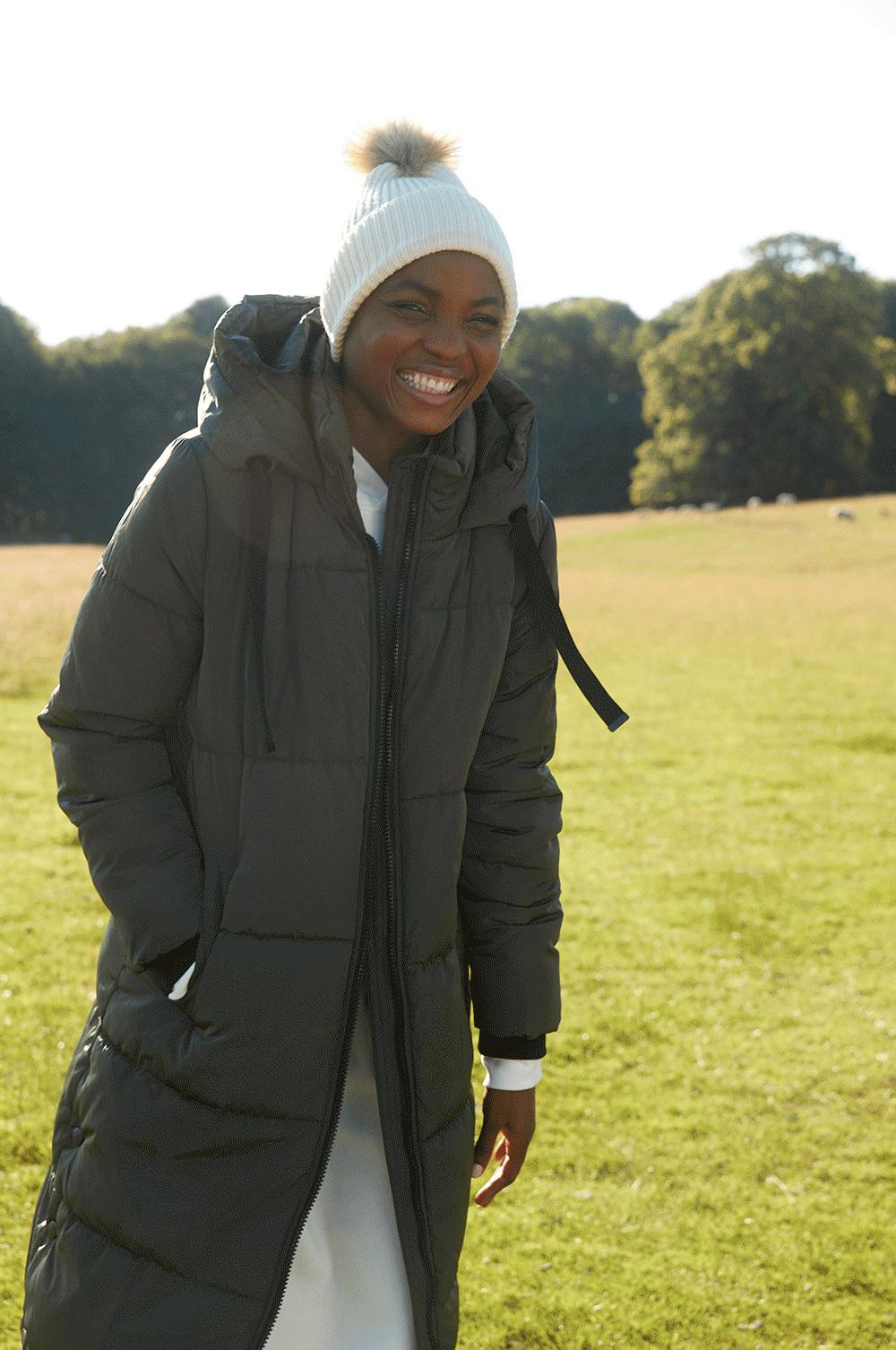 Model in coat and beanie