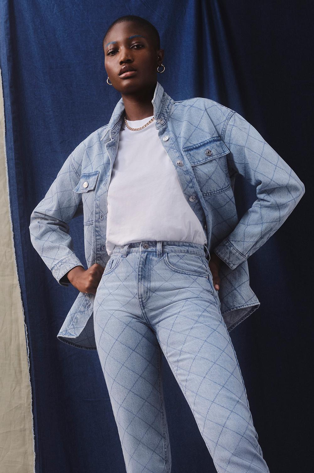 Model wearing quilted denim jeans