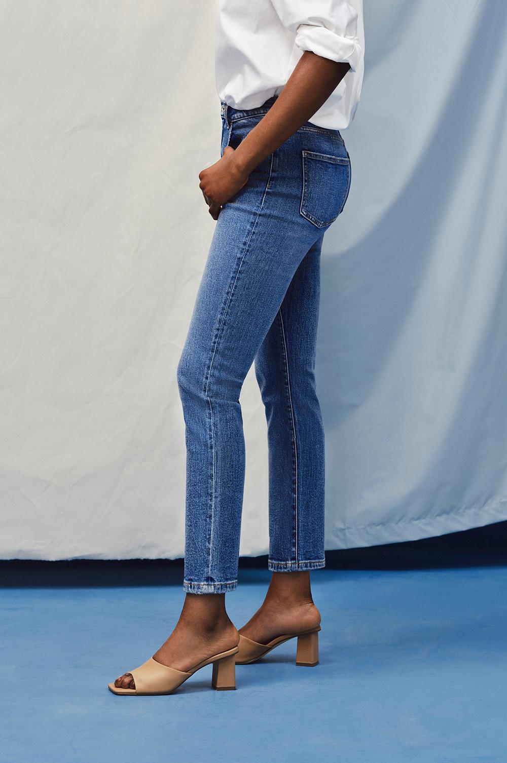 Model wearing The Slim Straight Leg Jean