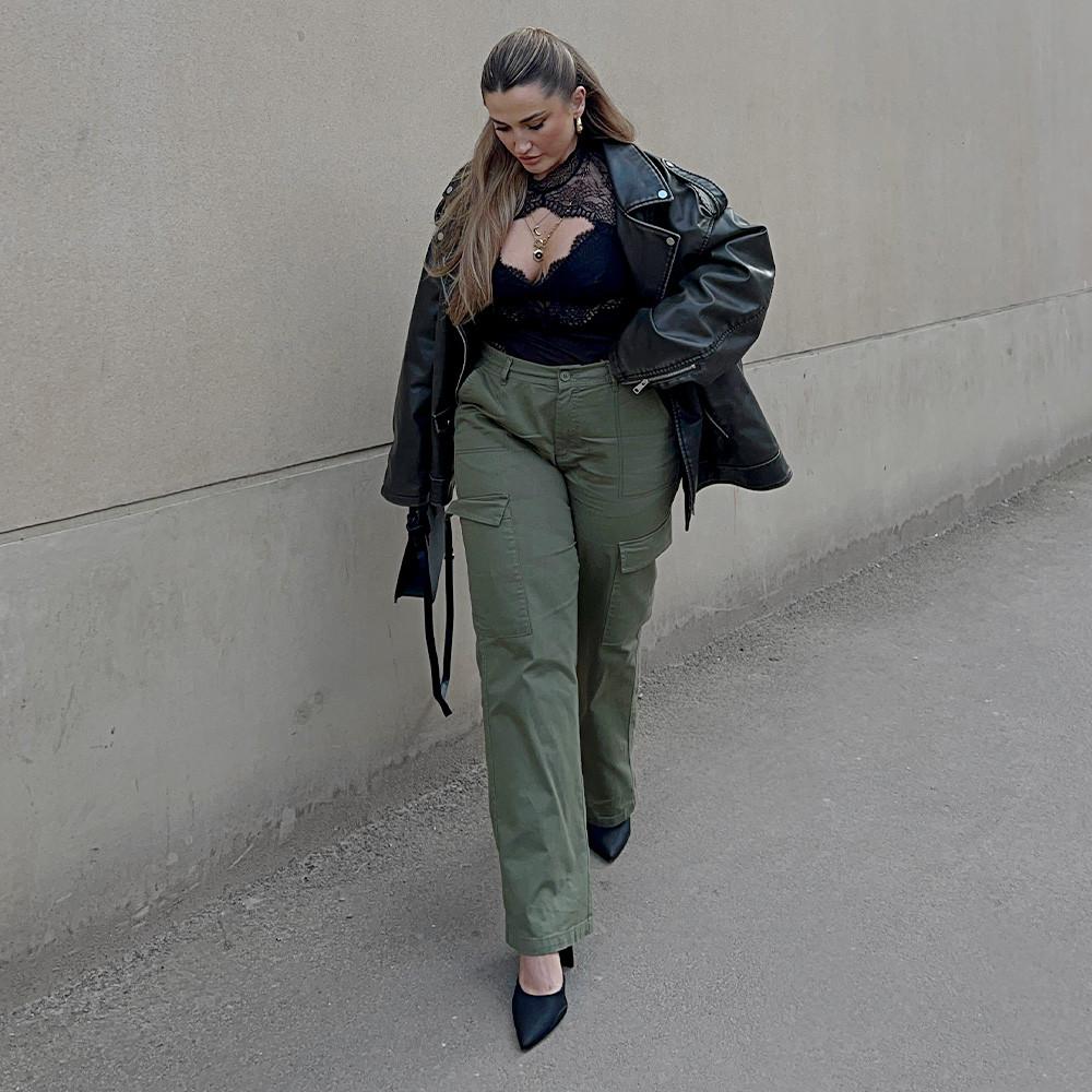 Model in green cargo pants