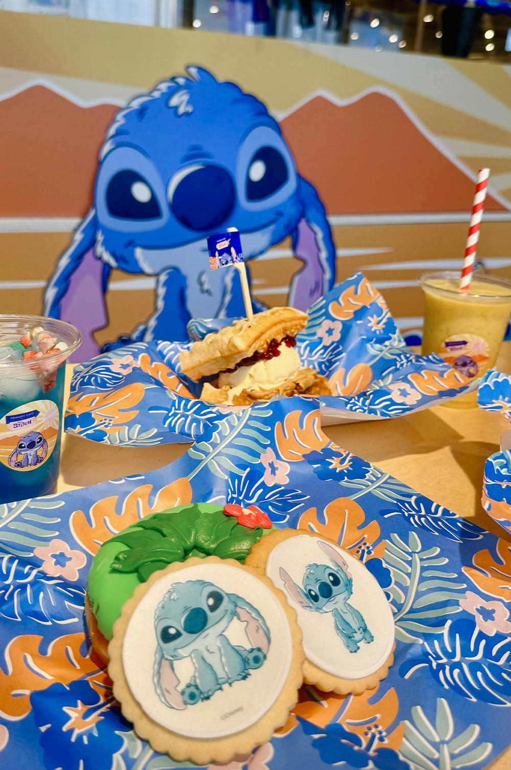 Biscuits from the Stitch café with Stitch themed napkins and plates