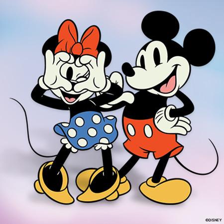 Classic Disney cartoon characters Mickey Mouse and Minnie Mouse standing together smiling.