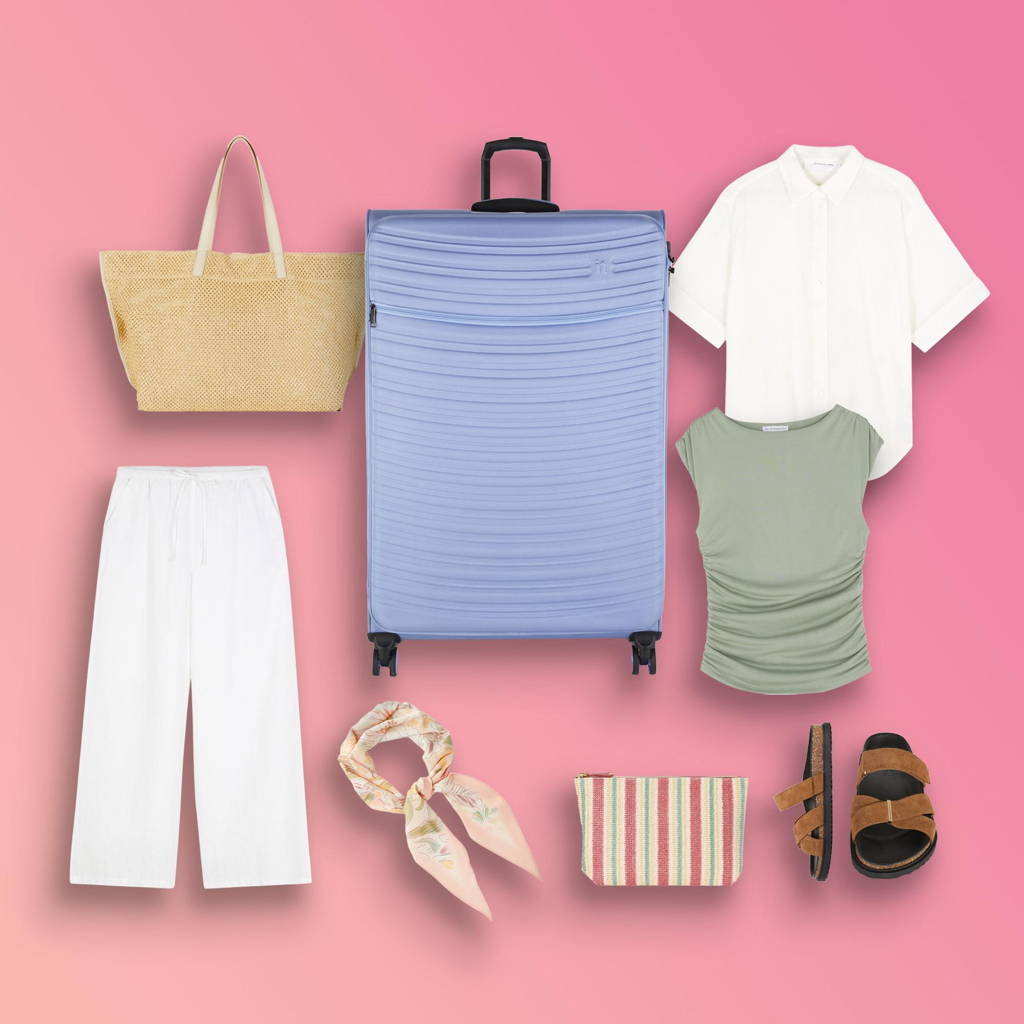 Summer travel collection featuring blue suitcase, yellow tote bag, white shirt, sage top, white trousers, patterned scarf, striped pouch and brown sandals.