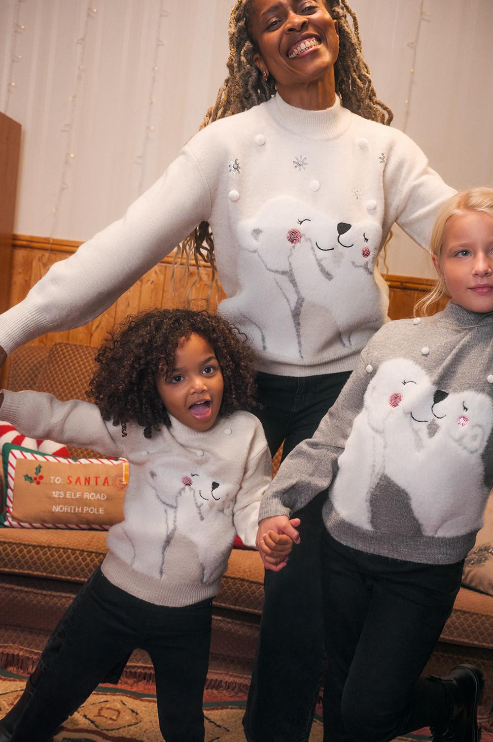 Matching christmas shop family jumpers