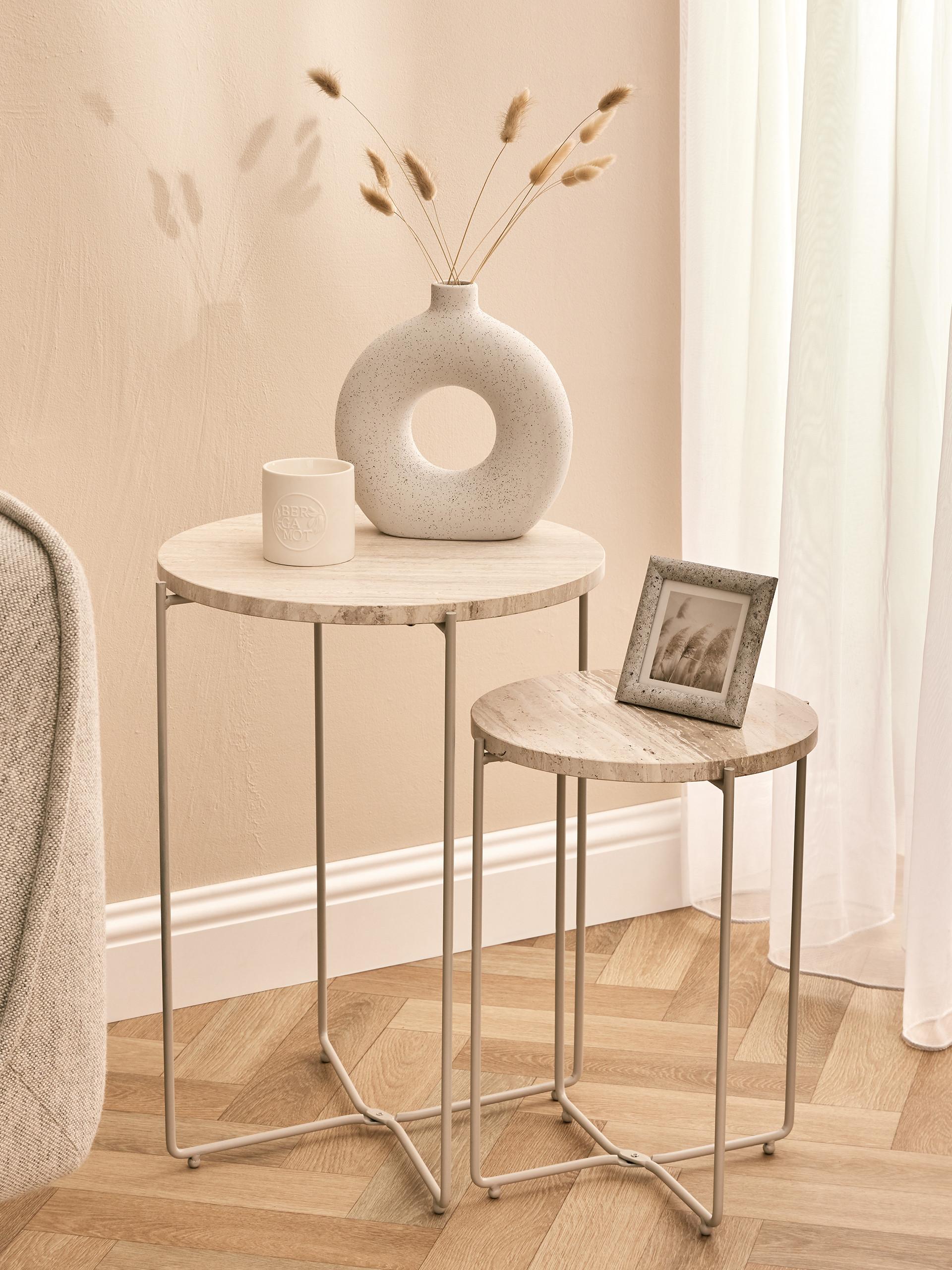 Coffee tables with vase, candle and photo frame