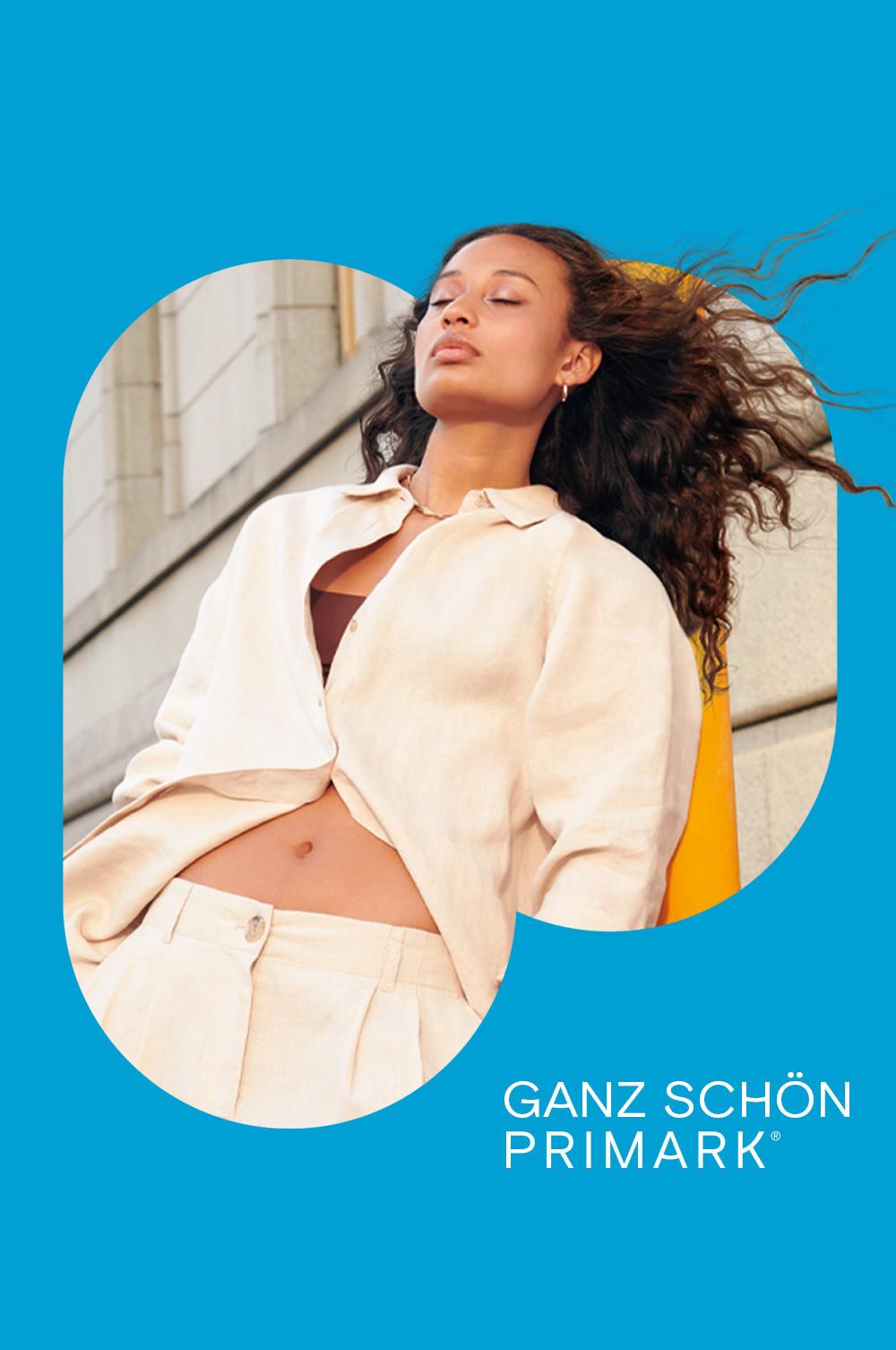 Model in Kombiteil aus Leinenhemd und Hose