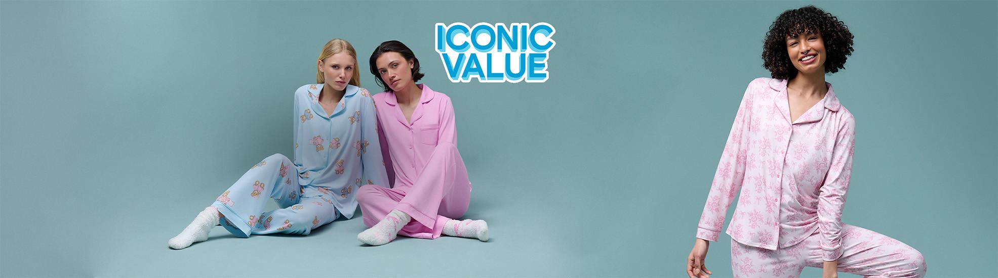 Three women wearing long-sleeved pj sets in light blue and pink with the text Iconic Value.