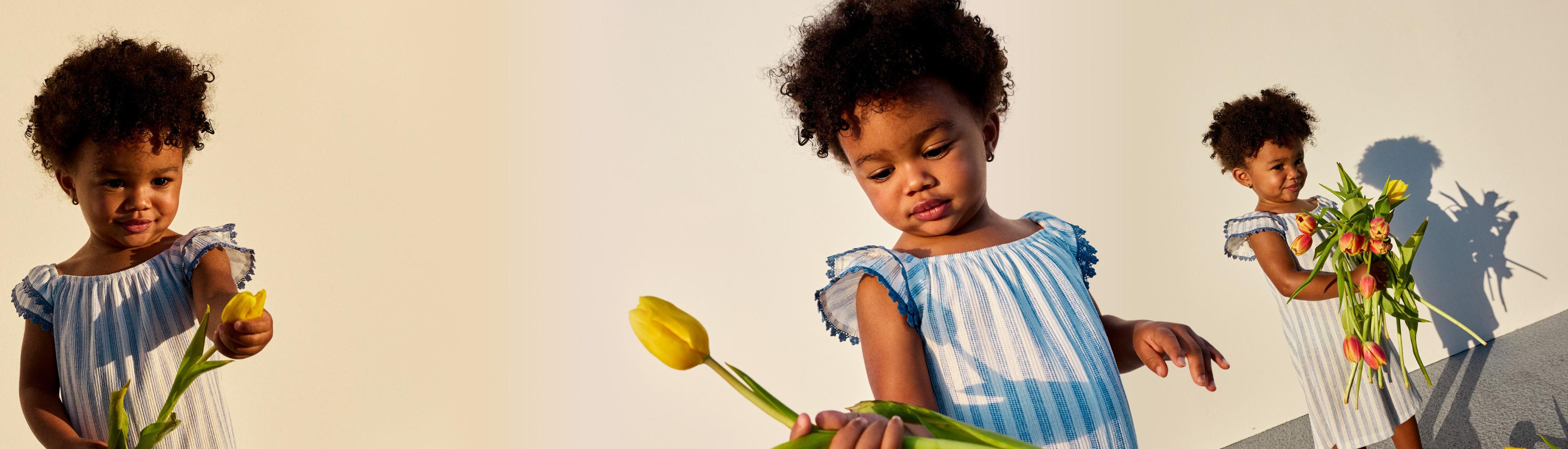 Copil purtând o rochie cu dungi albe și albastre ținând în mână lalele colorate în trei ipostaze diferite.