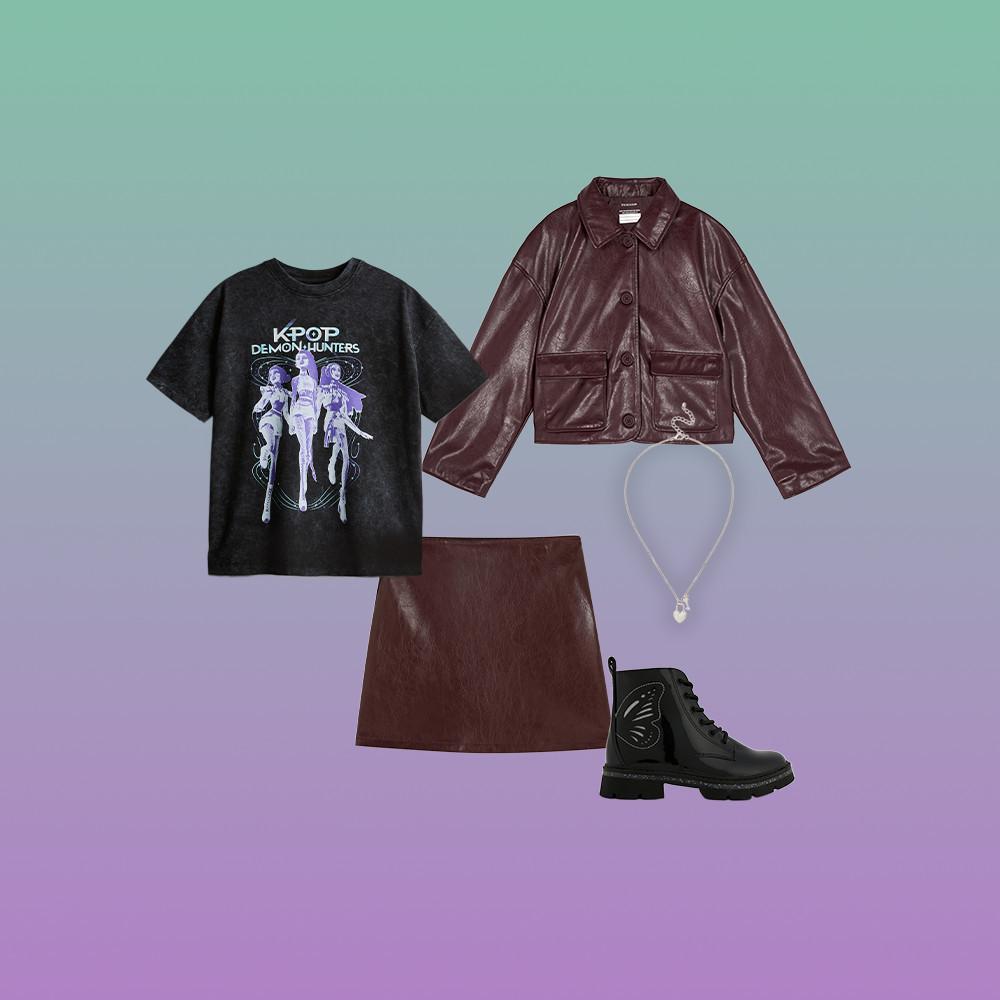 Outfit set featuring graphic t-shirt, burgundy leather jacket, matching mini skirt, black boots and heart necklace.