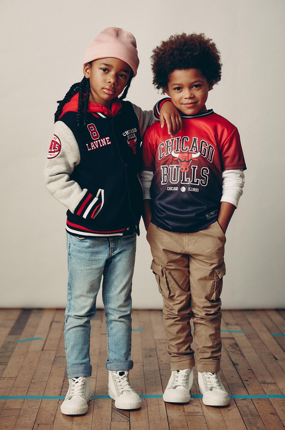 Kids in Bulls varsity jacket and top