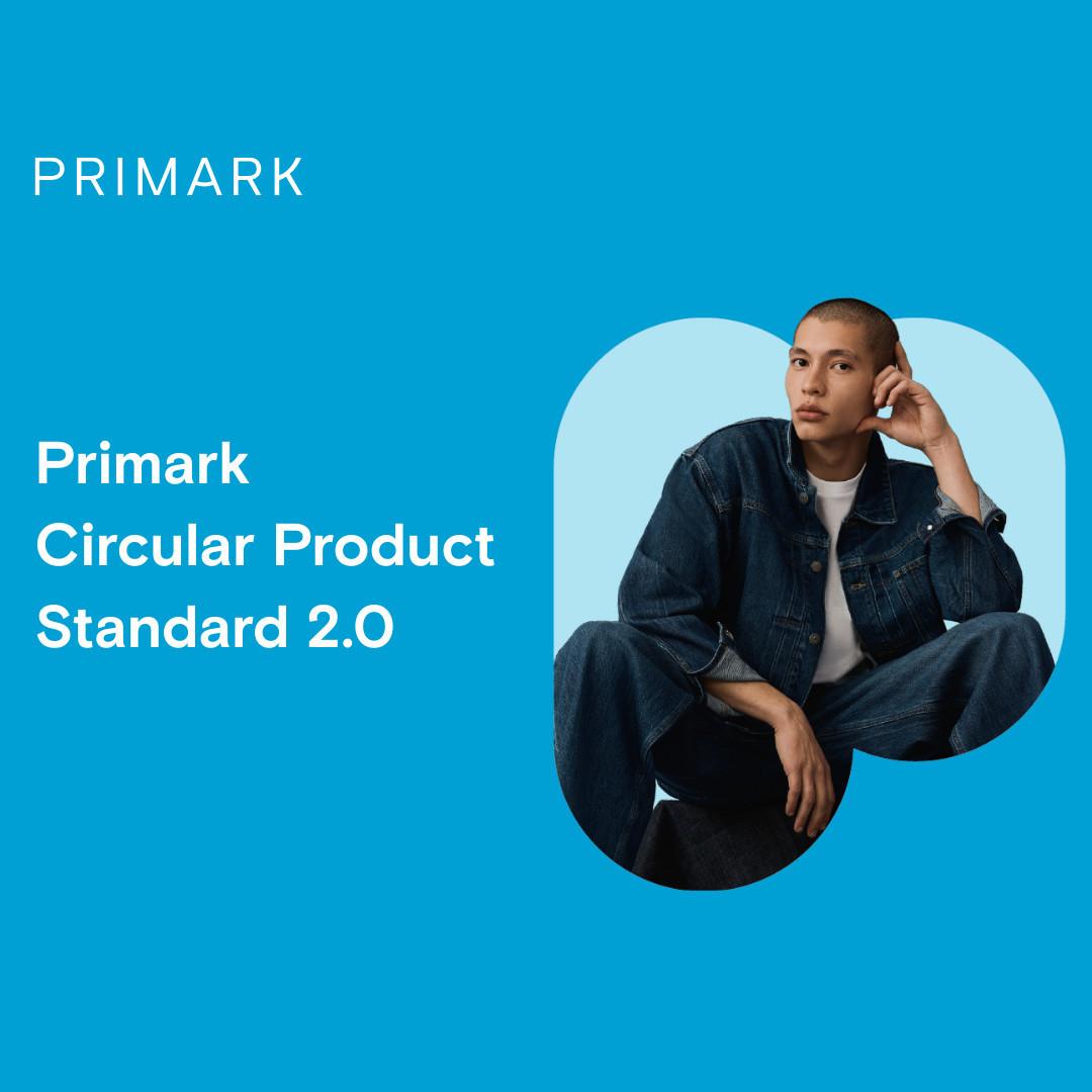 Person in denim outfit sits on a blue background. Text reads 'Primark Circular Product Standard 2.0'