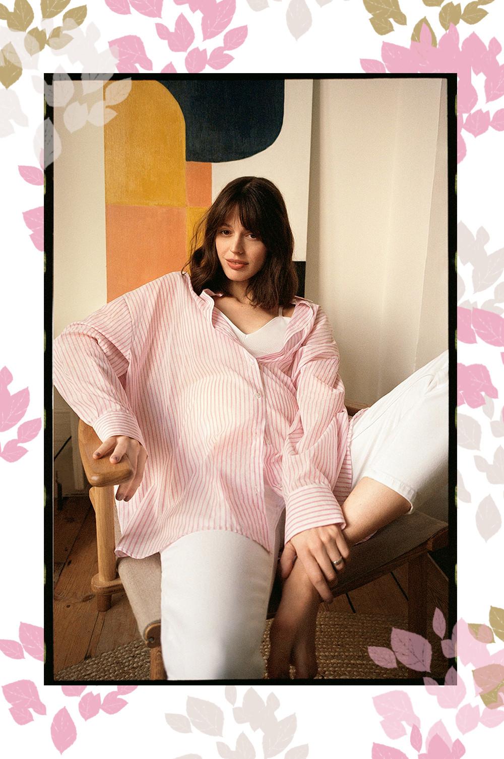 Model wears pink striped poplin shirt with ecru coloured mom jeans