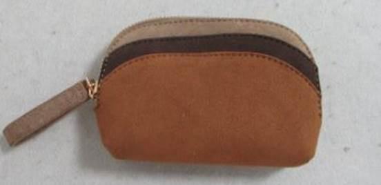 Tan leather cosmetic pouch with contrasting brown and cream striped trim and zip closure with wrist strap.