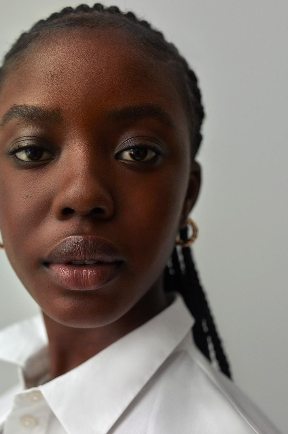 Close up of model wearing white shirt