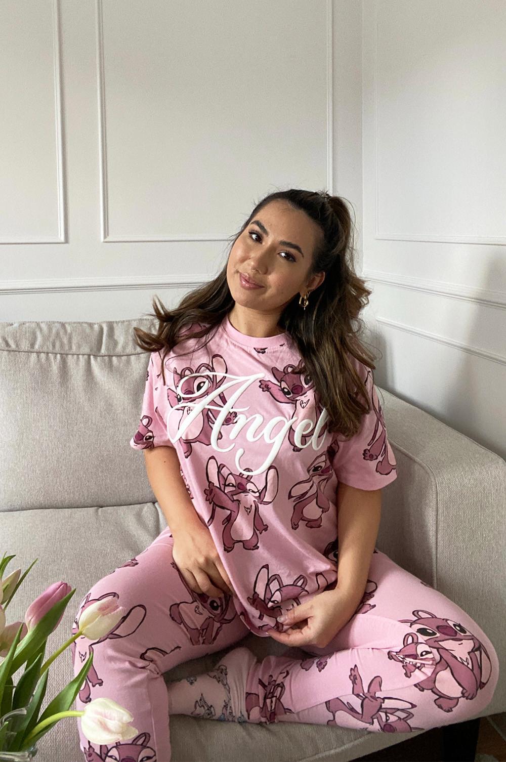 Model wears pink stitch pyjamas