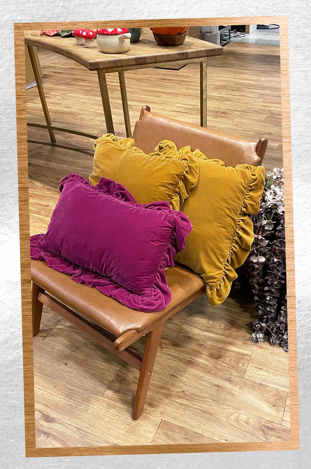 Cushions in mustard yellow and fuscia pink