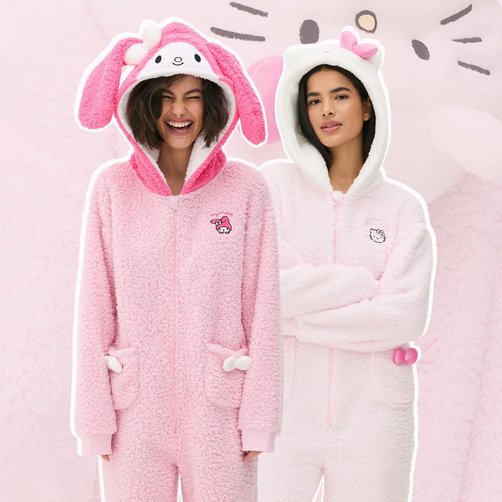 Two models wearing hello kitty pink onesies, one in My Melody theme both with pockets with bows