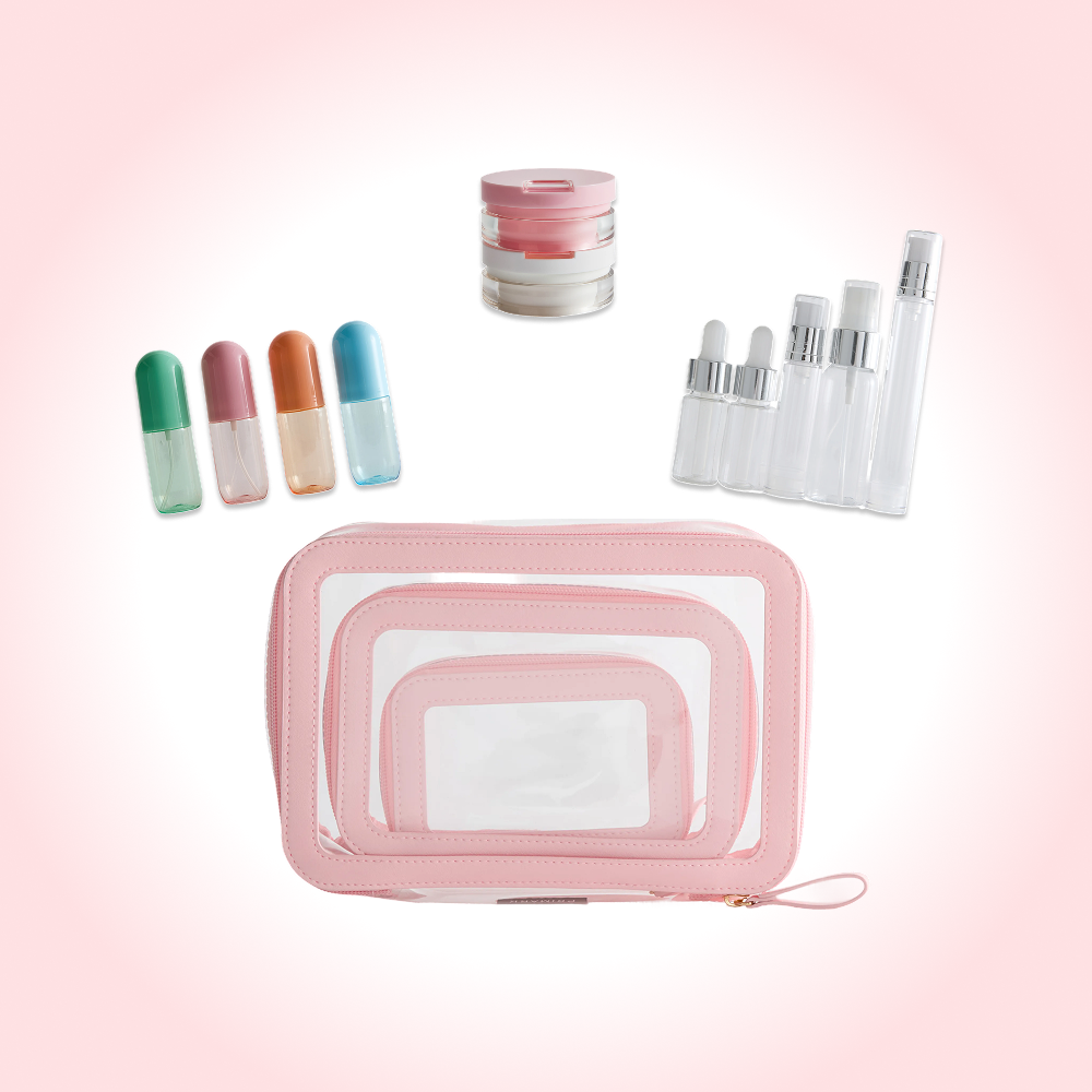 Pink travel cosmetics set with clear pouches, mini bottles, stackable containers and dropper vials.
