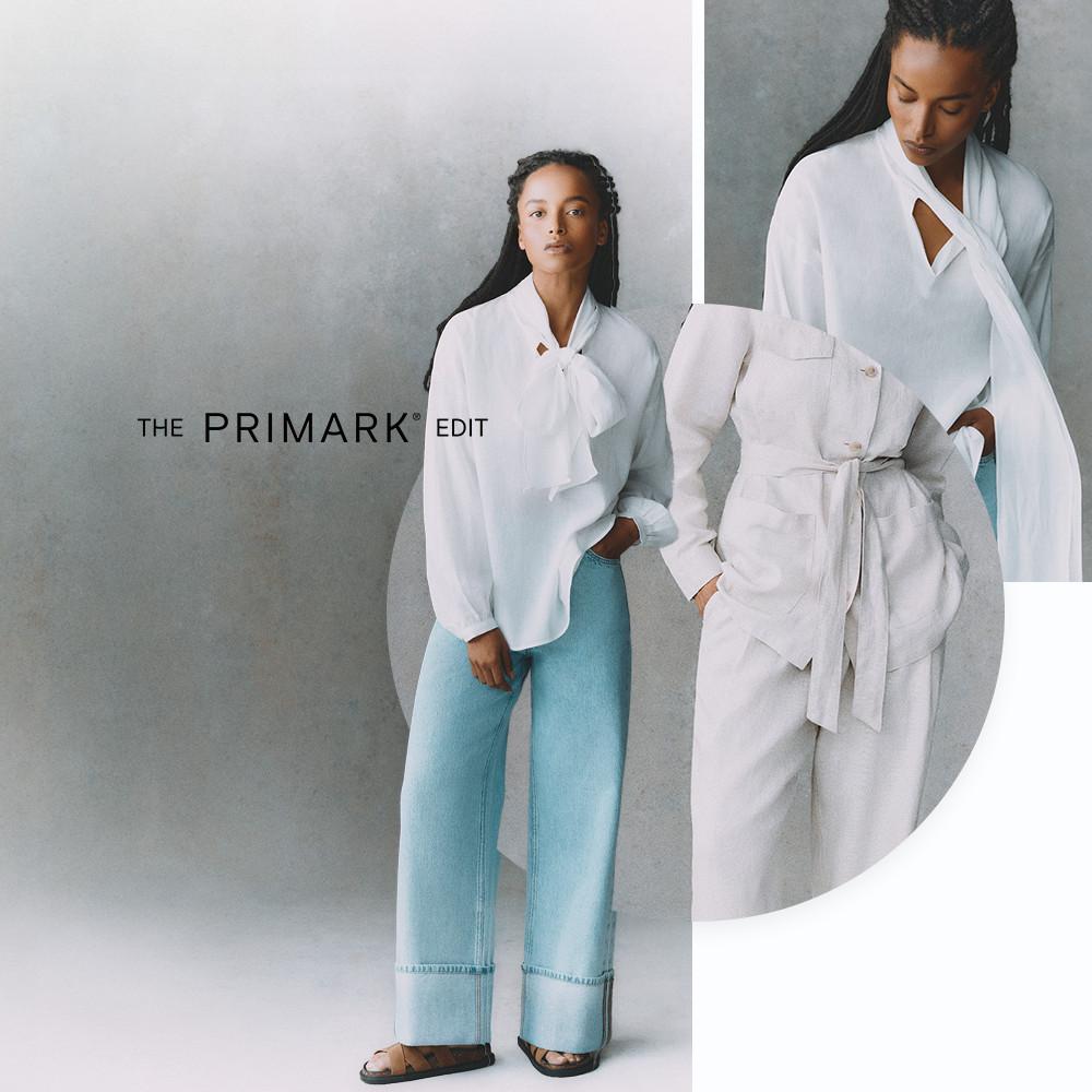 Primark's The Edit campaign showing white blouse with tie neck detail paired with light blue wide leg jeans and sandals.