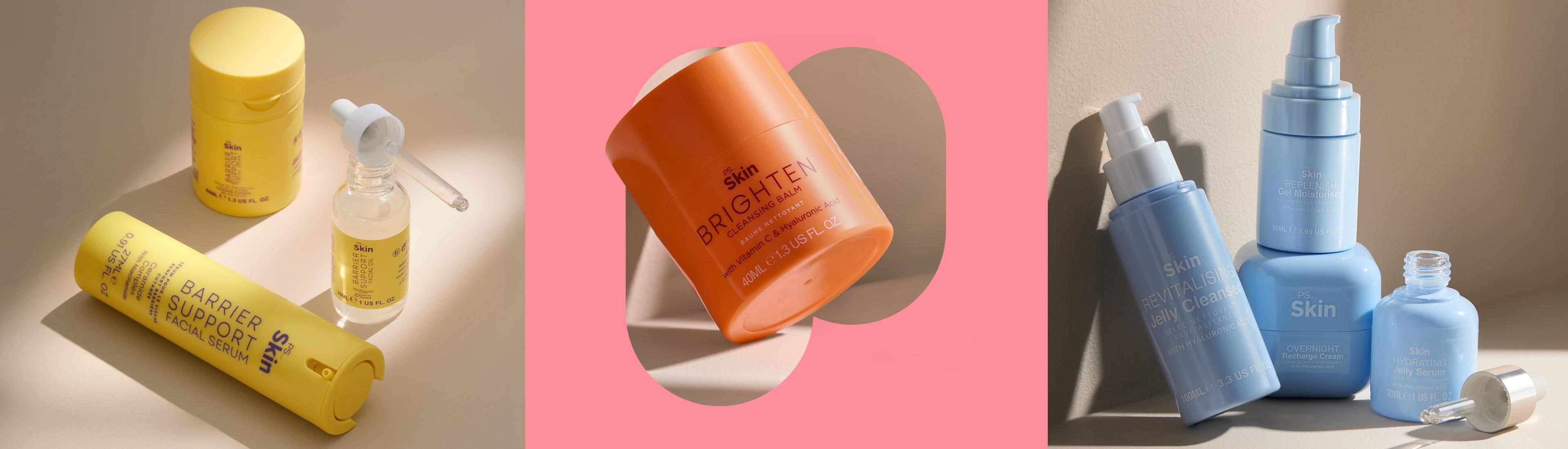 Colección de productos Skin para el cuidado de la piel, que incluye sérums en recipientes amarillos para proteger la barrera cutánea, bálsamo limpiador en un frasco naranja y productos hidratantes y limpiadores en recipientes azules.