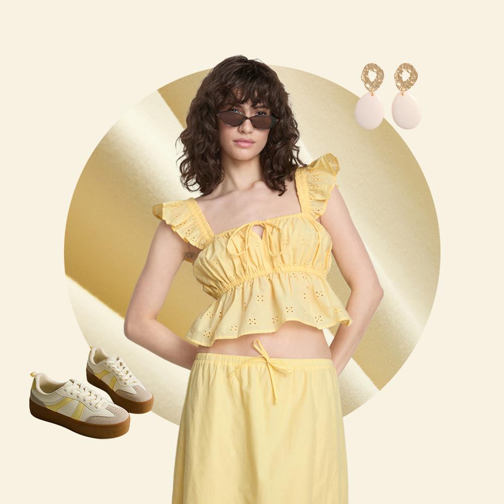 Two models wearing pale yellow knitwear - one in a matching set, the other in a peplum top with jeans.