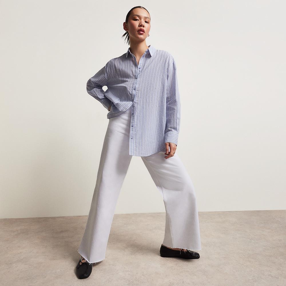Woman in shirt and jeans