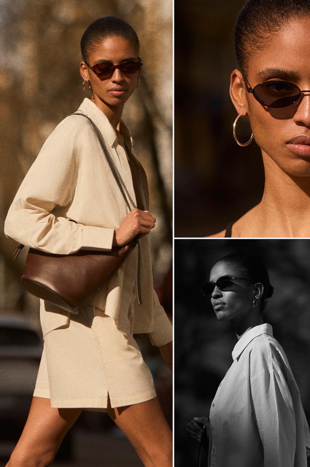 Model wearing rectangular sunglasses, gold hoop earrings, beige outfit and carrying a brown leather bag.
