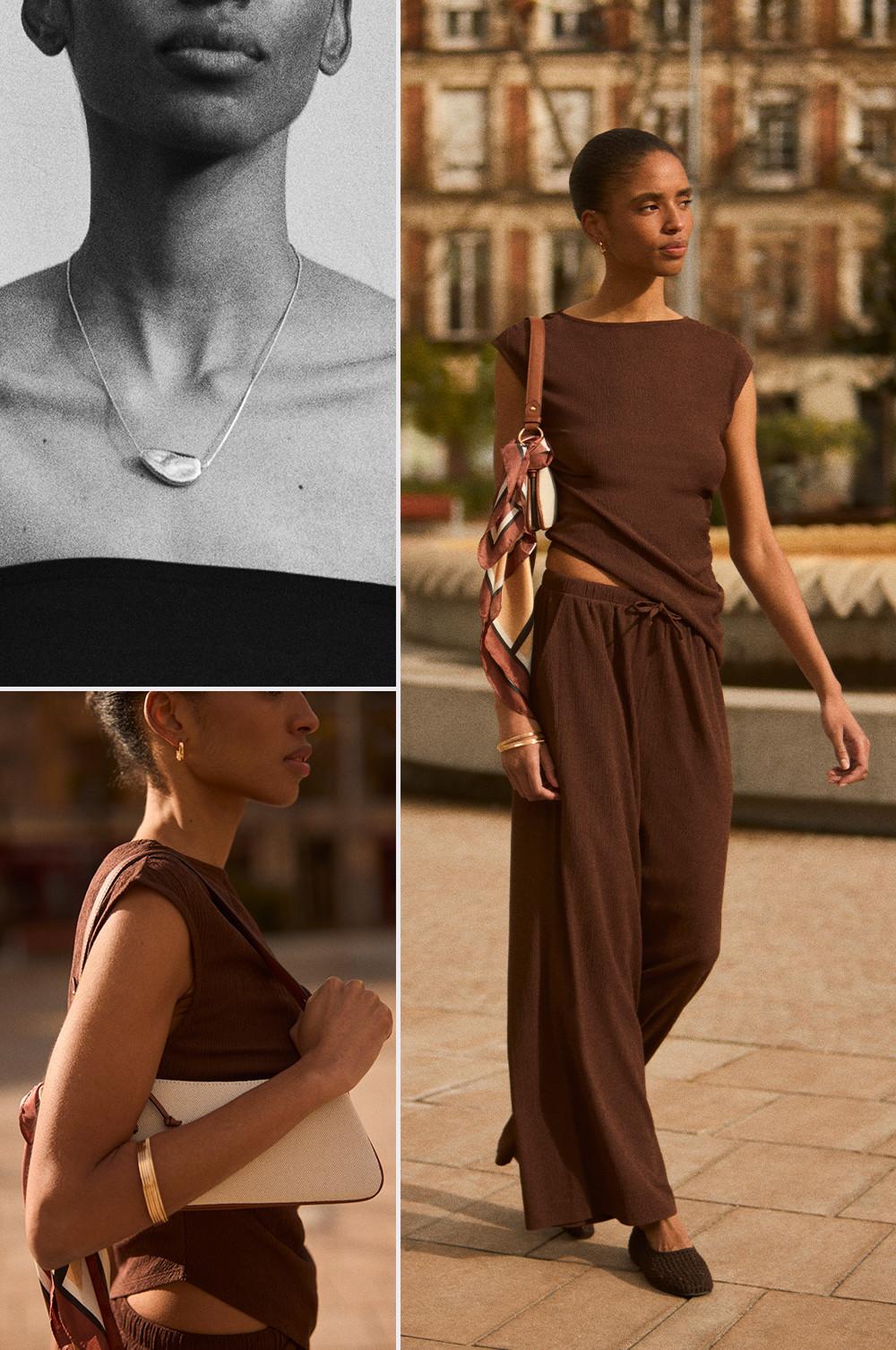 Model wearing brown sleeveless top and matching wide-leg trousers, styled with pendant necklace and handbag.