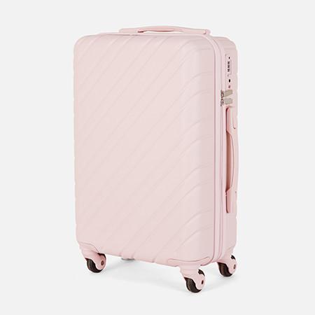 Pink ribbed suitcase