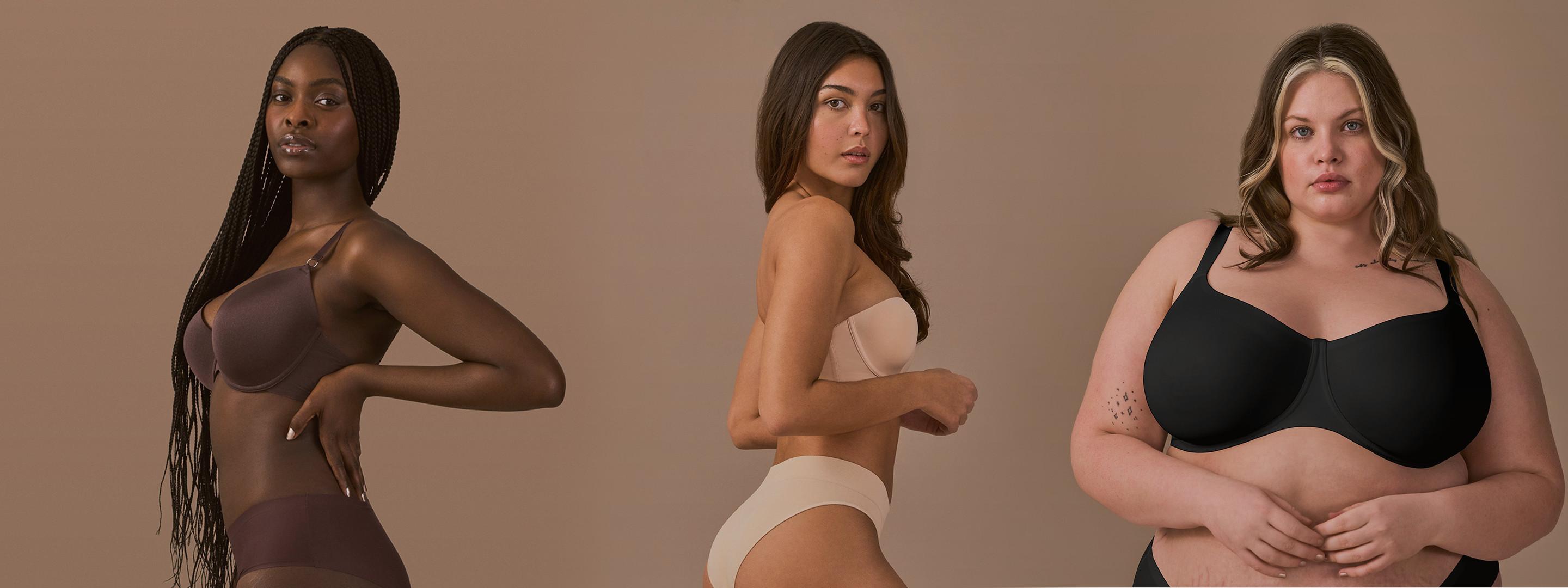 Drei Models, die verschiedenfarbige BHs und Slips in verschiedenen Größen tragen.